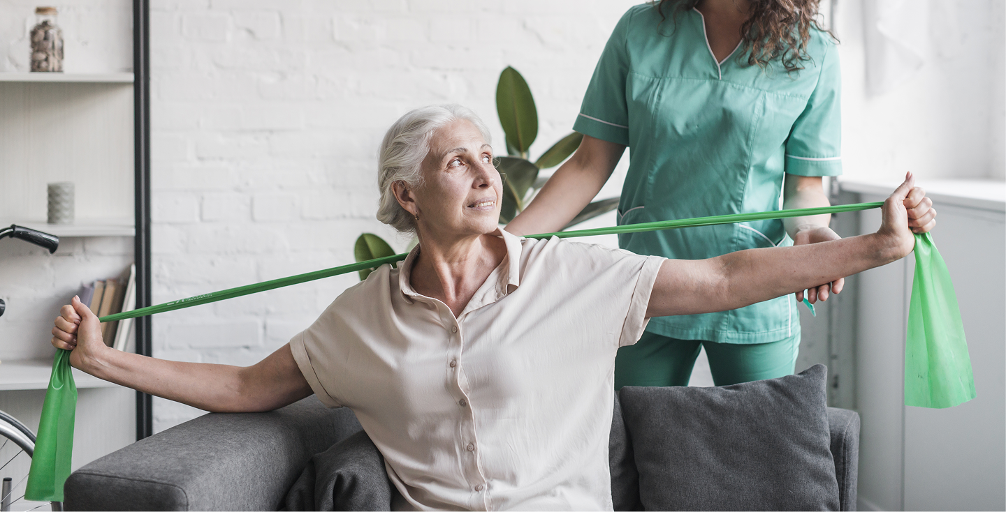 Professional healthcare nurse assisting elderly patient